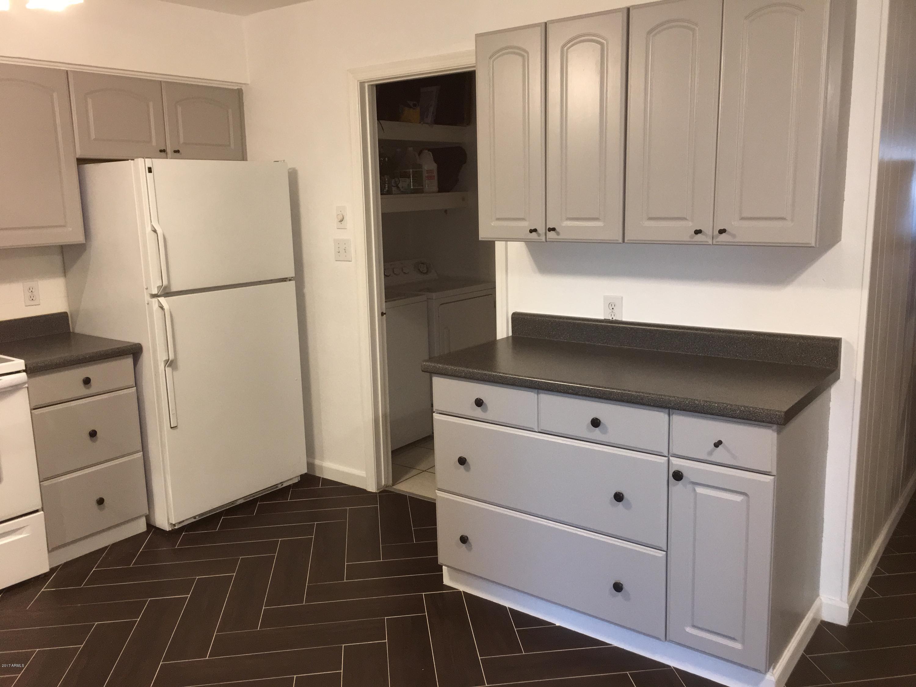 2833 West Wagoner Road Phoenix, AZ 85053 - Photo 7 of 28 Kitchen to Laundry Room