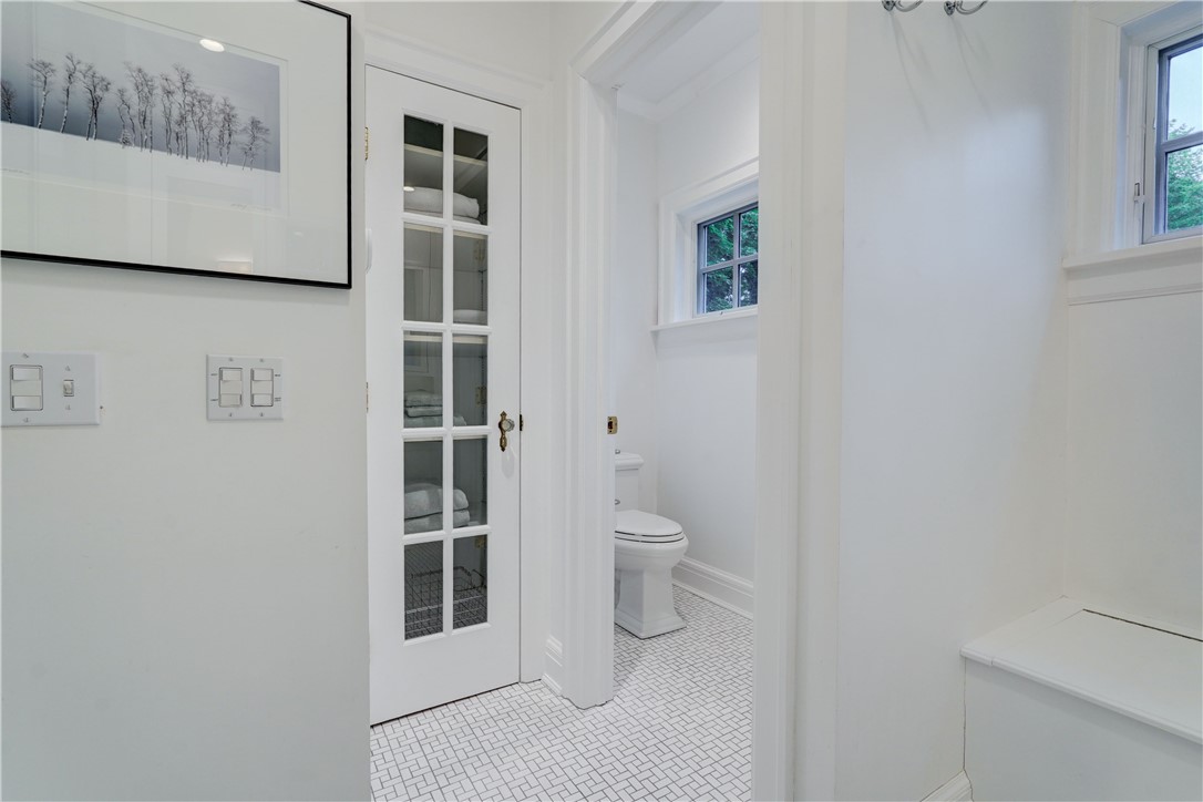 264 Alpine Drive Rochester, NY 14618 - Photo 31 of 50 A separate water closet & more storage in the prim