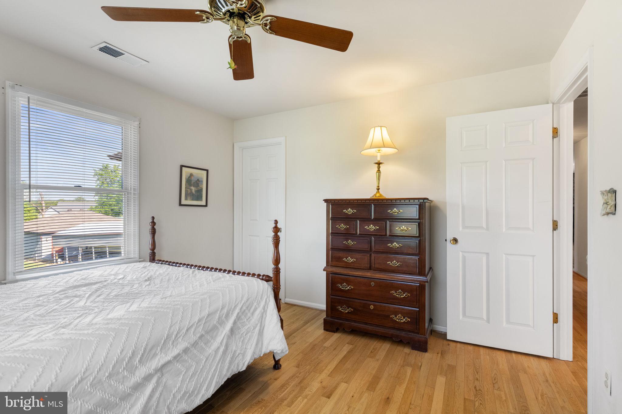 161 Troy Road Louisa, VA 23093 - Photo 26 of 60 a bedroom with a bed and a dresser
