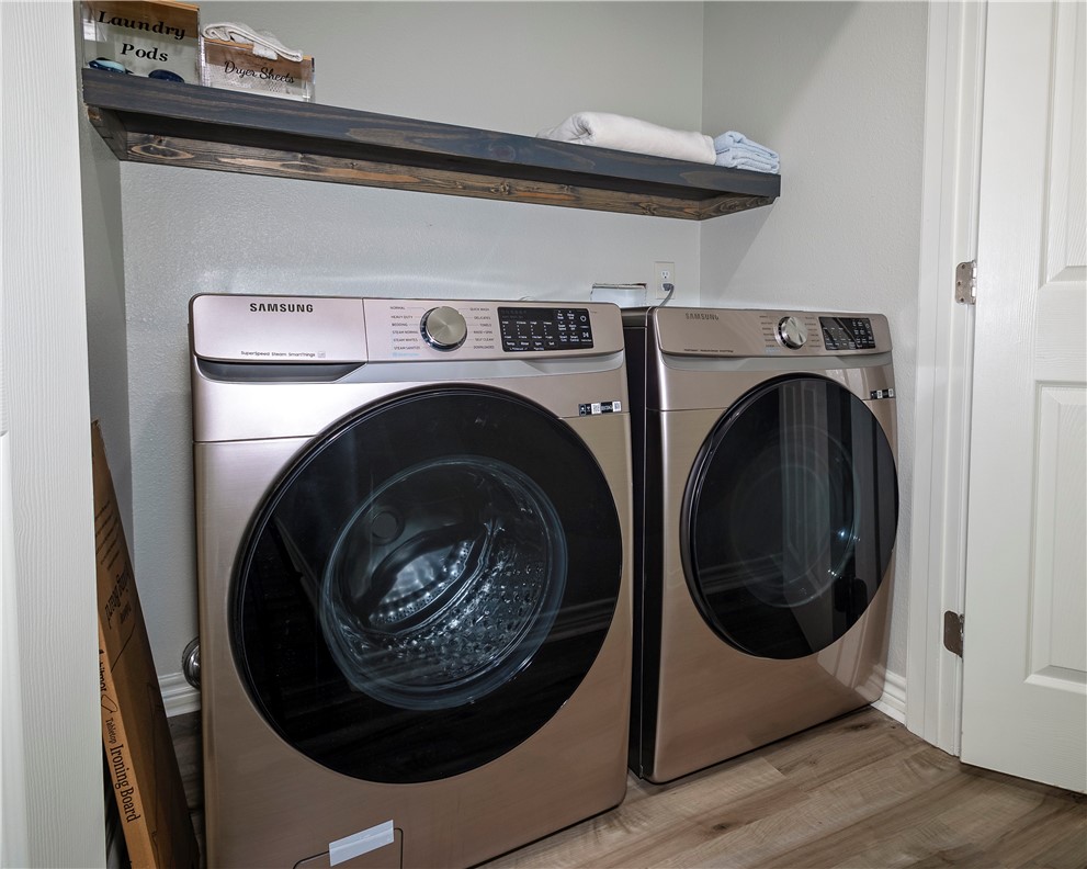 1217 O'Connell Street Corpus Christi, TX 78418 - Photo 14 of 23 a close up view of washer and dryer