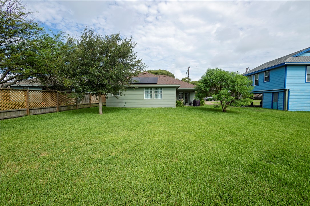 1217 O'Connell Street Corpus Christi, TX 78418 - Photo 21 of 23 a view of a house with a yard and sitting area