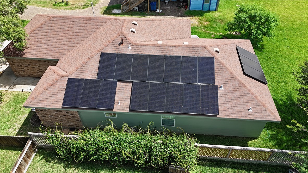 1217 O'Connell Street Corpus Christi, TX 78418 - Photo 23 of 23 a aerial view of a house with a yard and potted plants