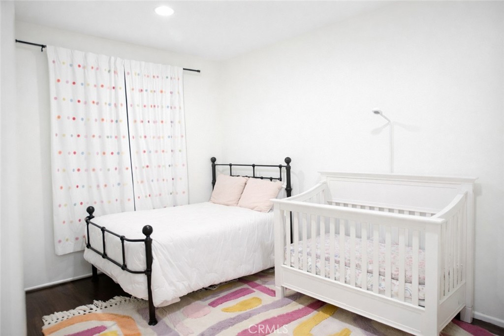 4689 Brookmore Court Riverside, CA 92505 - Photo 10 of 10 a bedroom with a bed and a window