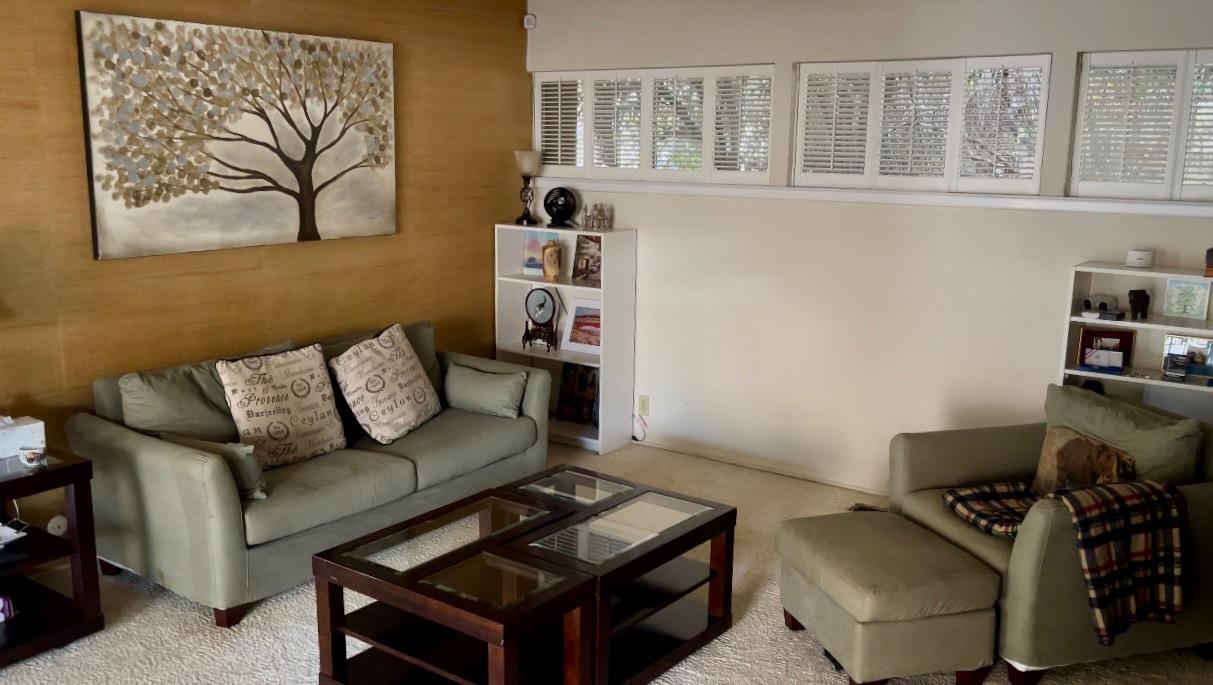 737 West Rialto Avenue Fresno, CA 93705 - Photo 3 of 11 a living room with furniture and a window