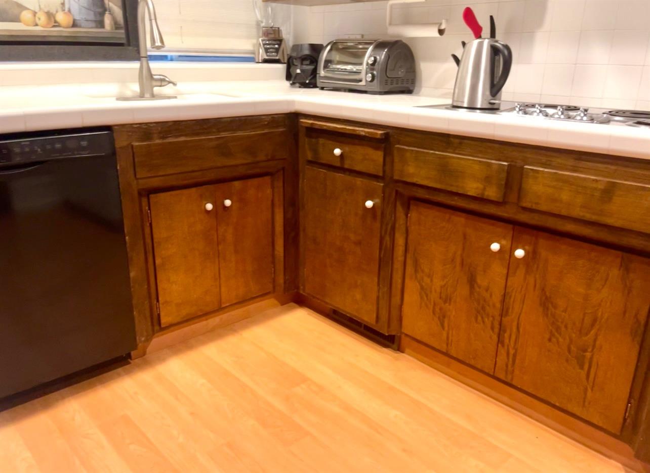737 West Rialto Avenue Fresno, CA 93705 - Photo 5 of 11 a kitchen with a sink and cabinets
