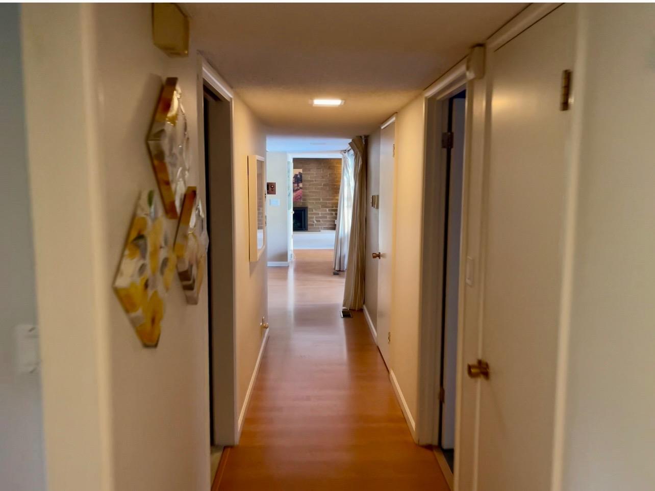 737 West Rialto Avenue Fresno, CA 93705 - Photo 9 of 11 a view of a hallway with wooden shelves