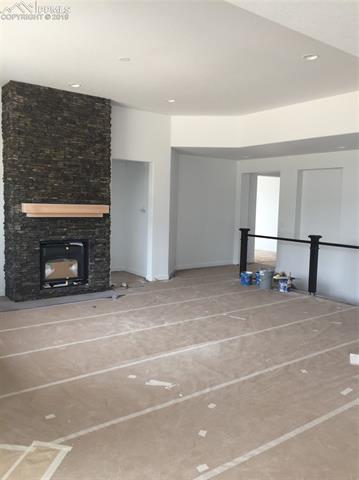 12433 Carmel Ridge Road Colorado Springs, CO 80921 - Photo 10 of 22 Spacious great room.