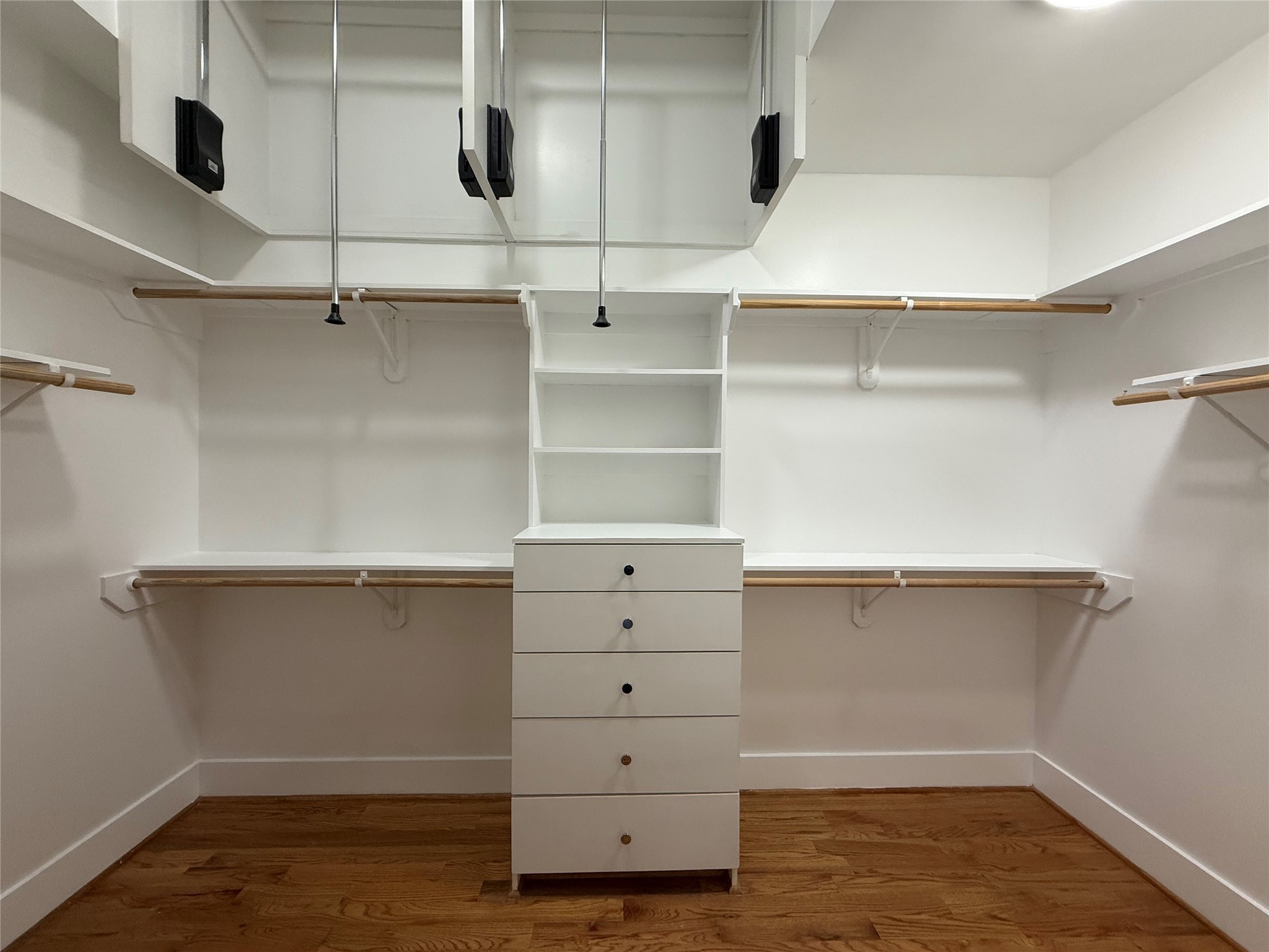 1608 Patterson Street, Unit A Houston, TX 77007 - Photo 13 of 20 a view of an empty walk in closet