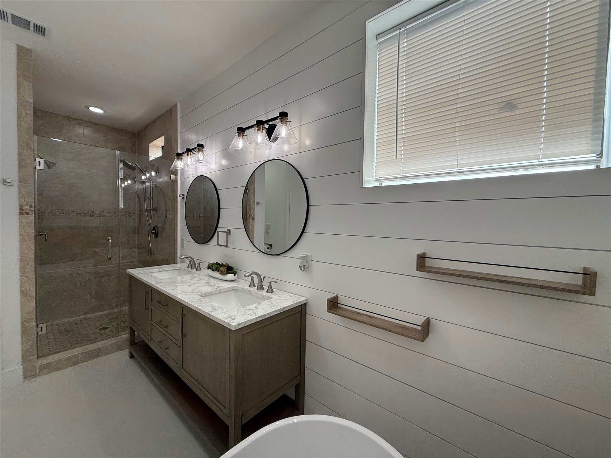 1608 Patterson Street, Unit A Houston, TX 77007 - Photo 16 of 20 a bathroom with a toilet sink vanity and mirror