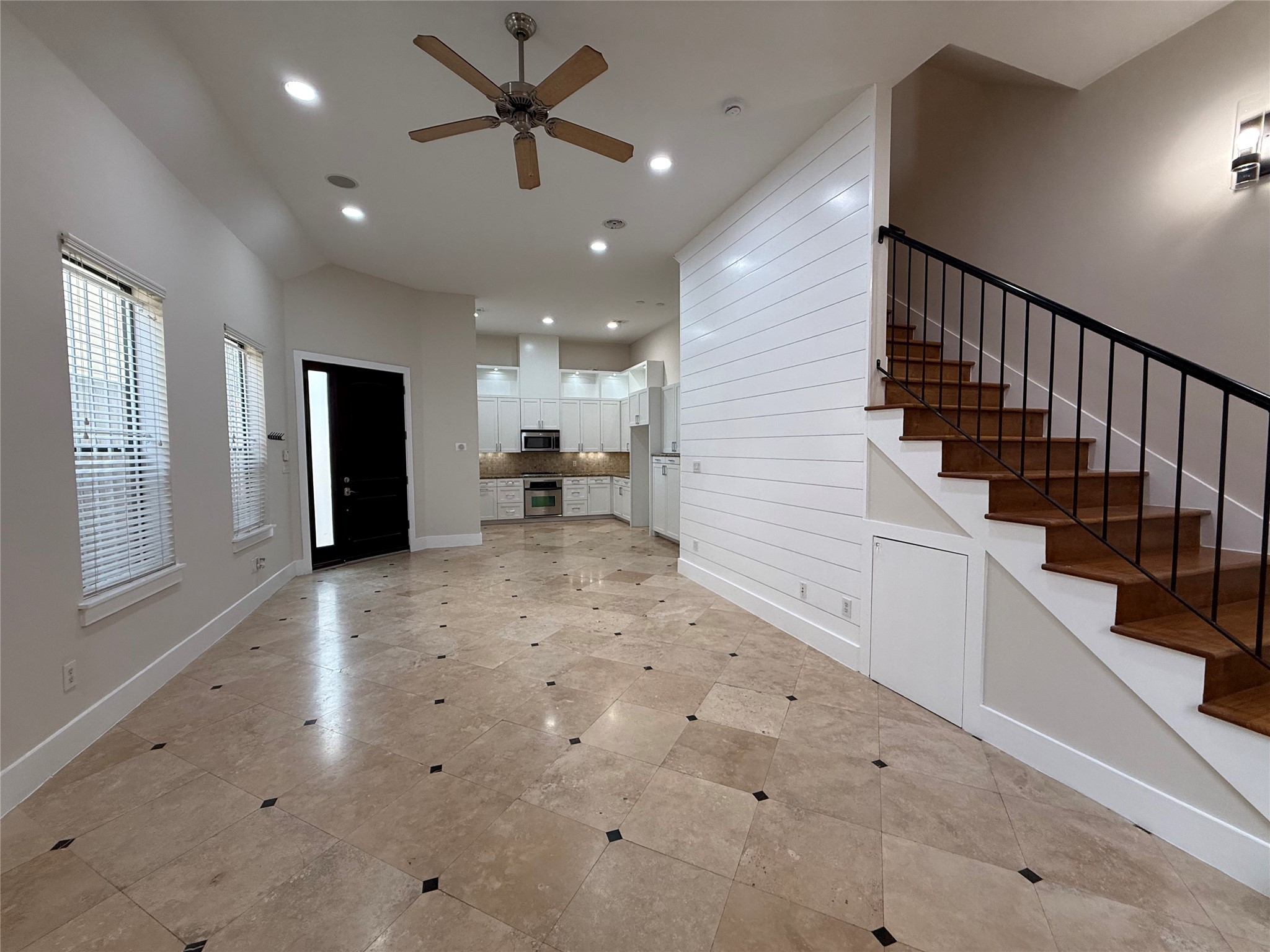 1608 Patterson Street, Unit A Houston, TX 77007 - Photo 4 of 20 a view of a hallway with stairs and a window