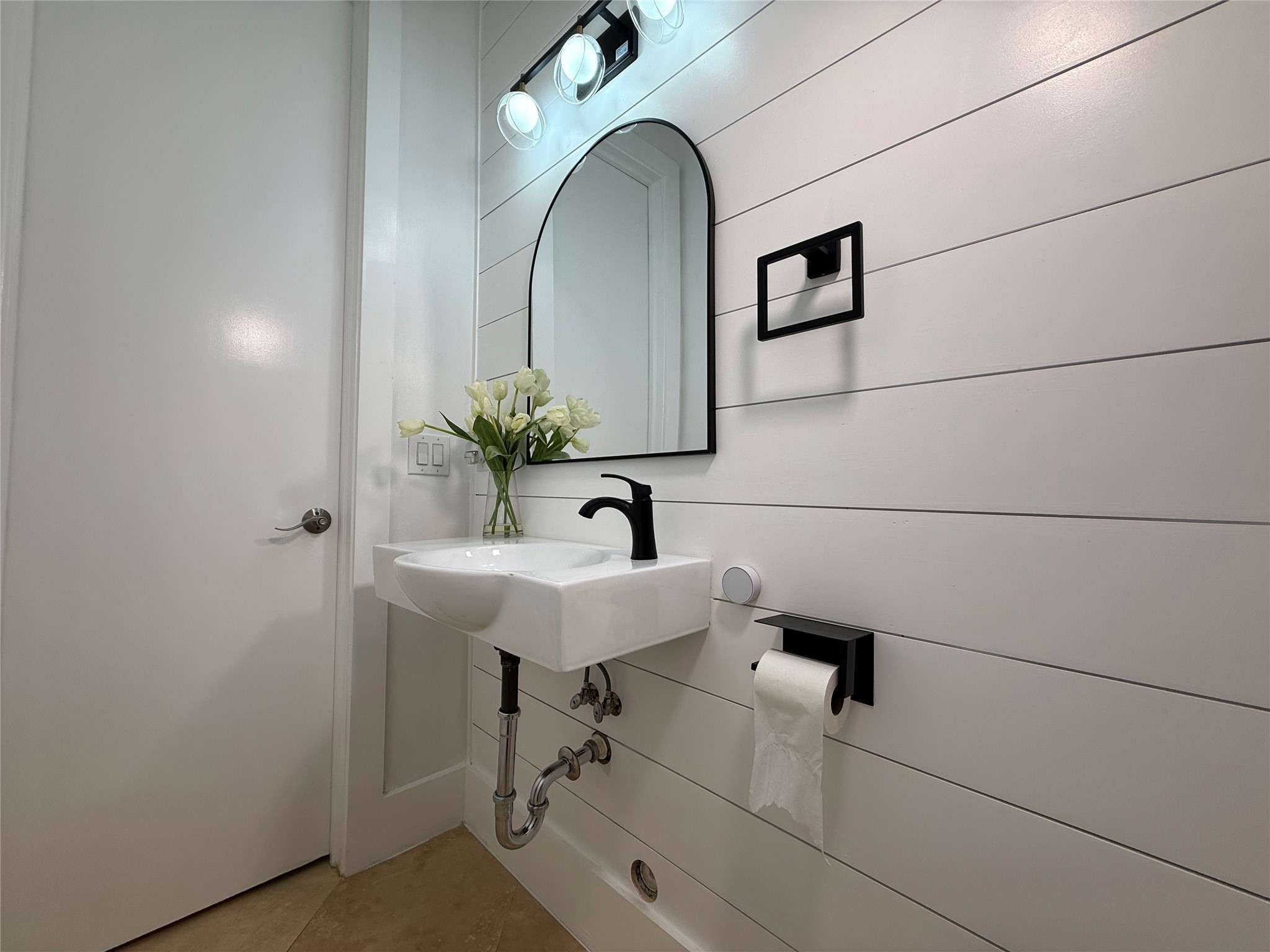 1608 Patterson Street, Unit A Houston, TX 77007 - Photo 8 of 20 a bathroom with a sink and a mirror