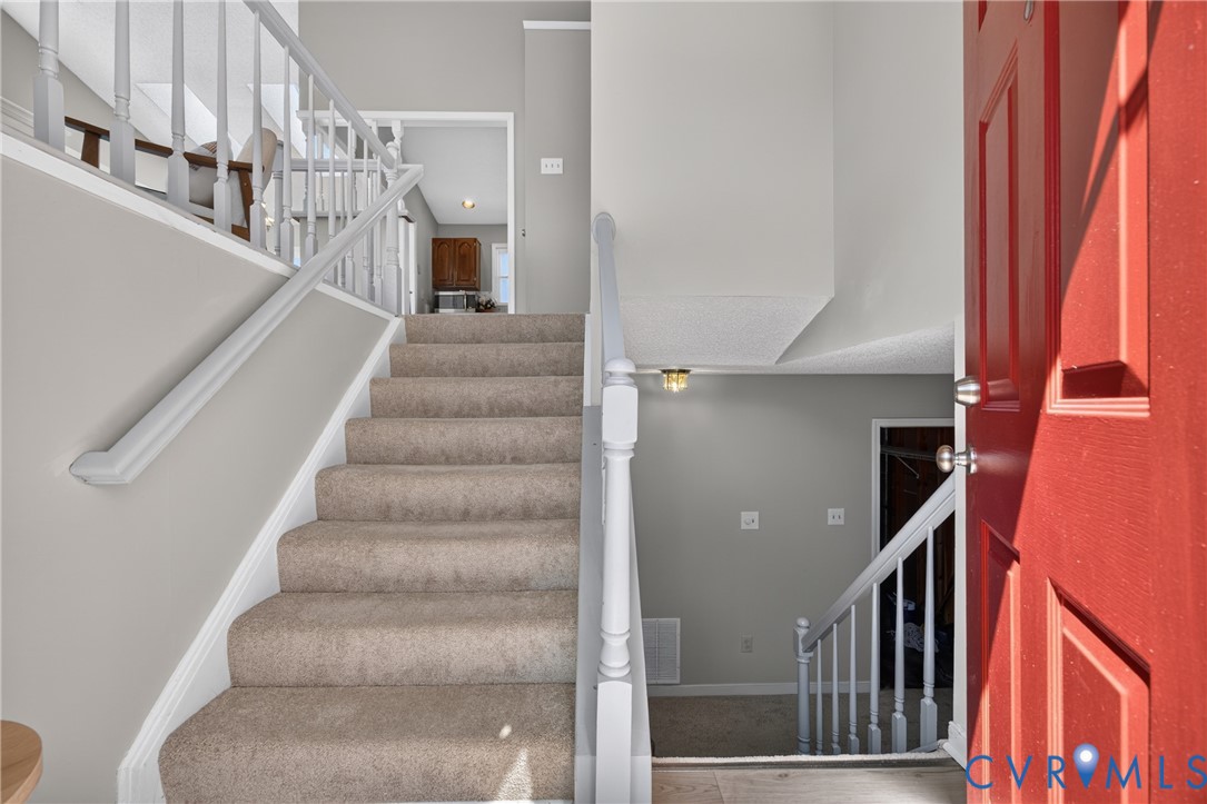 1559 Tree Ridge Road Henrico, VA 23231 - Photo 5 of 40 Inviting entry foyer featuring a red paneled front