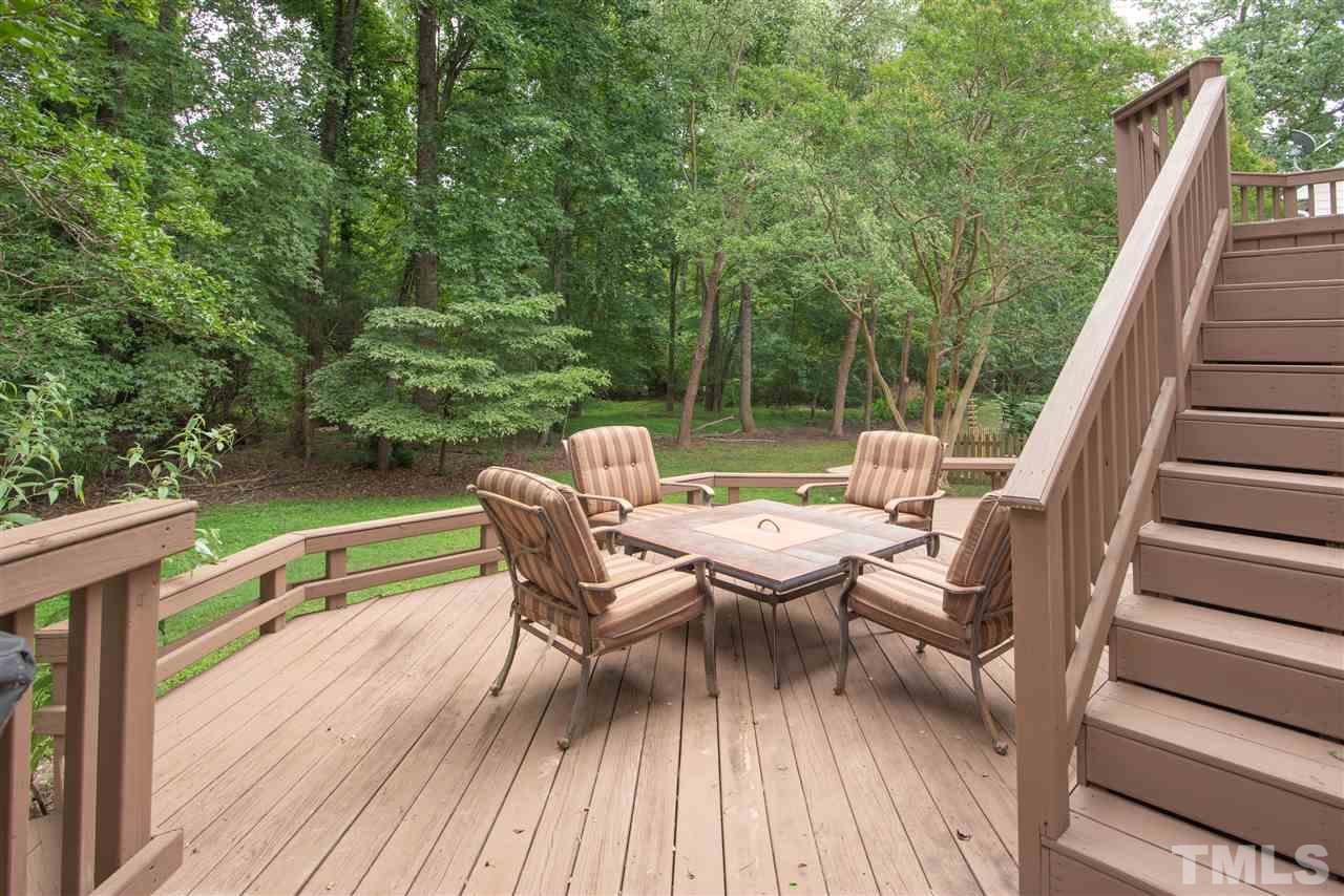 2921 Englefield Drive Raleigh, NC 27615 - Photo 22 of 27 a view of balcony with furniture and garden