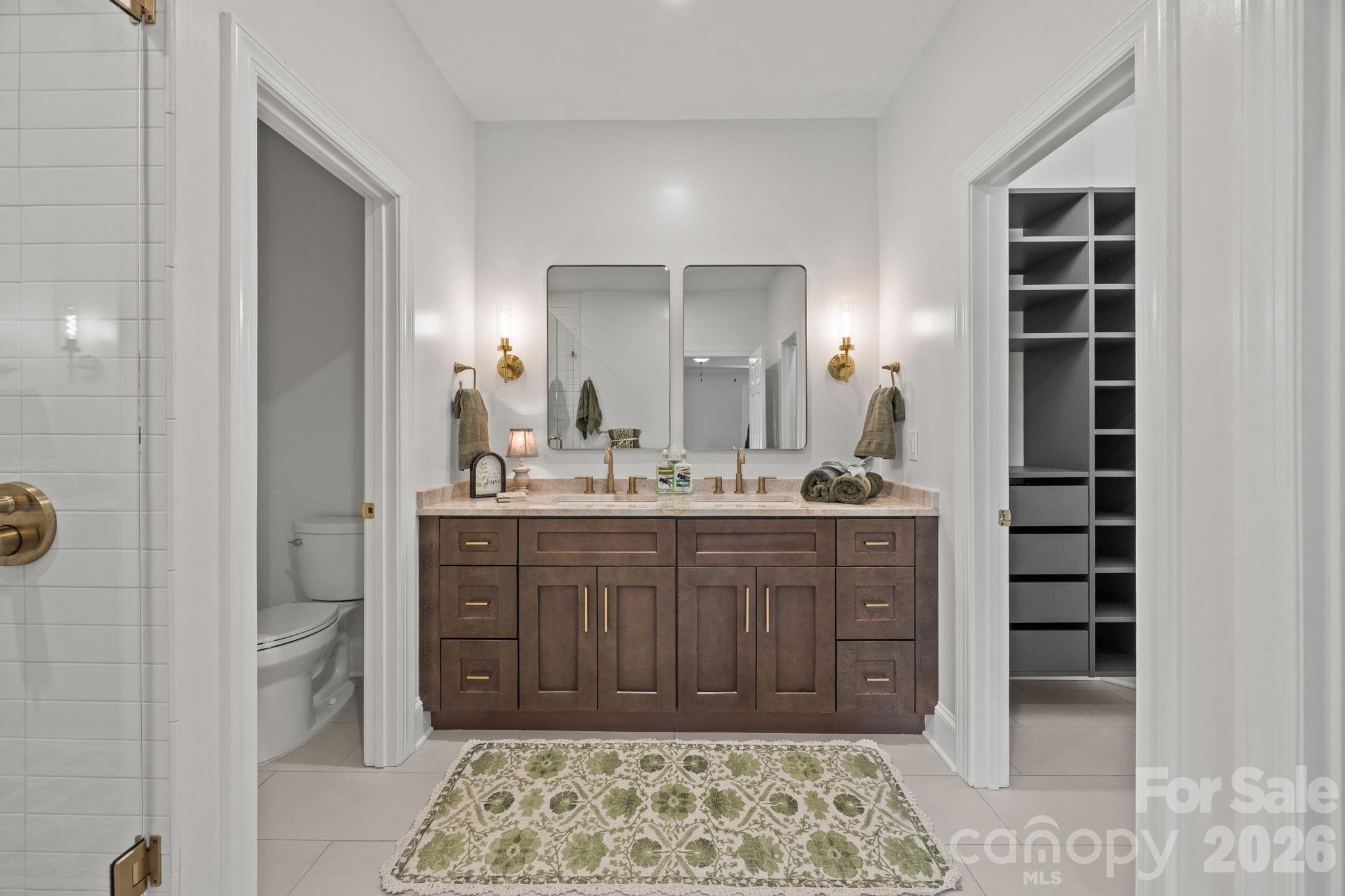 5243 Mintridge Road Mint Hill, NC 28227 - Photo 22 of 43 a bathroom with a sink and a mirror