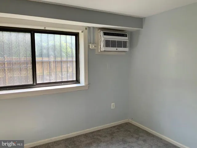 a bathroom with a sink toilet and mirror
