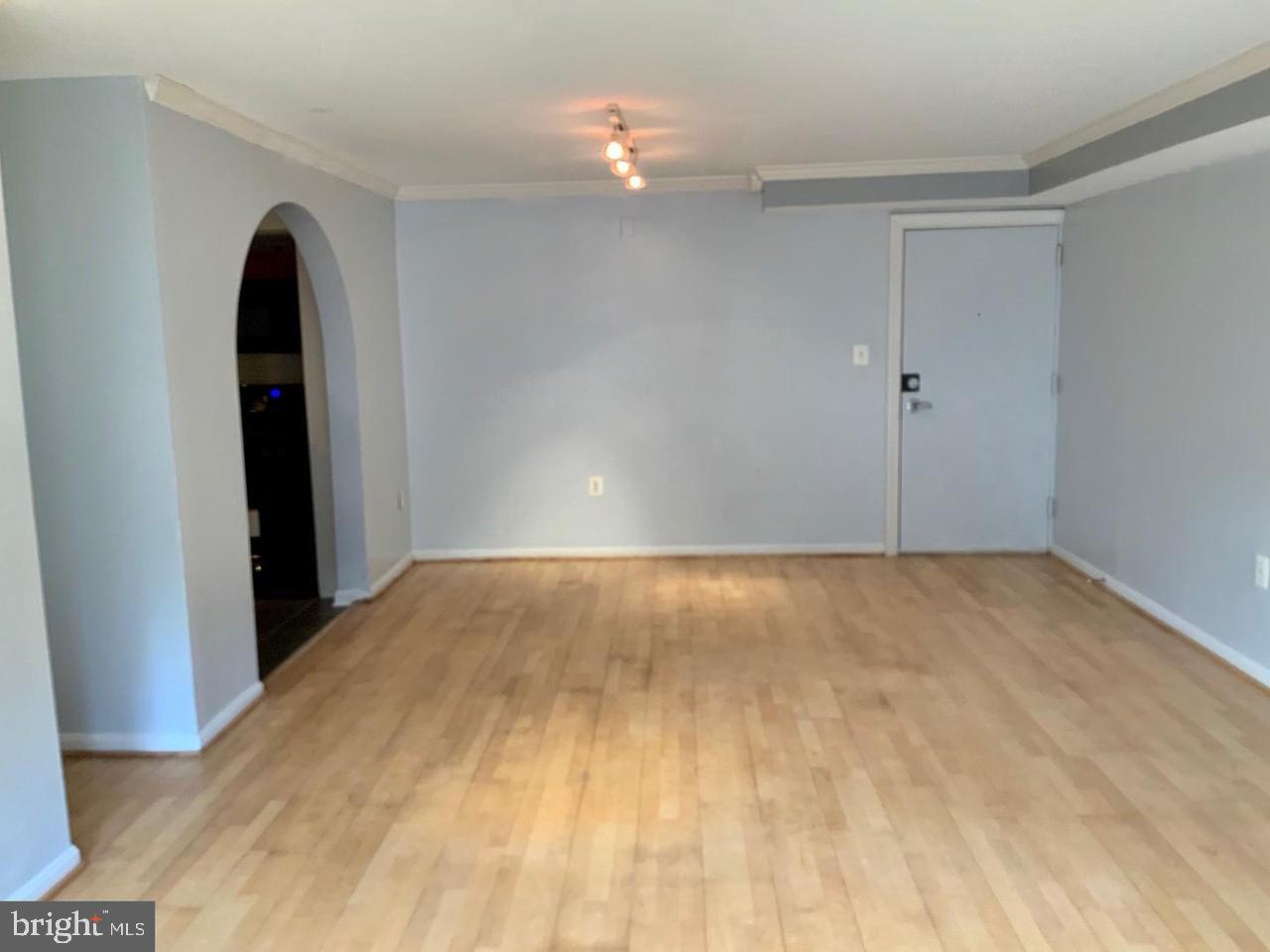 3109 Naylor Road Southeast, Unit C Washington, DC 20020 - Photo 5 of 20 a view of empty room with ceiling fan