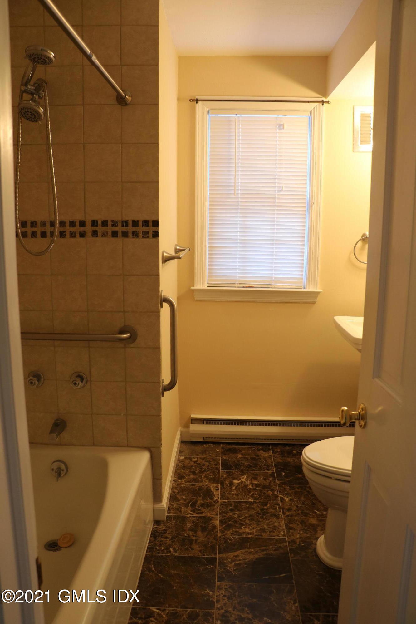 46 Ledge Brook Road Stamford, CT 06903 - Photo 16 of 23 a bathroom with a shower and a toilet
