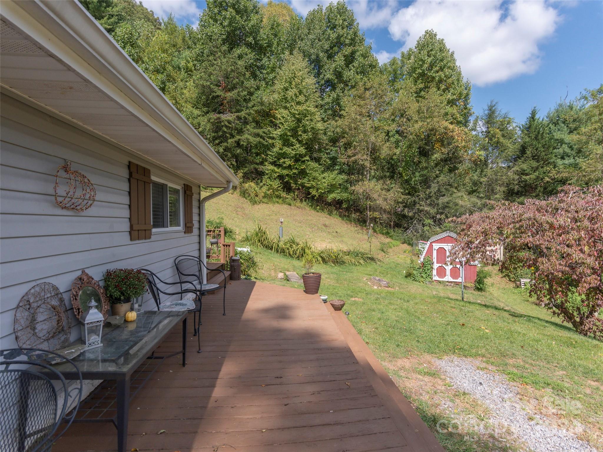 883 Price Town Road Clyde, NC 28721 - Photo 27 of 34 a view of a patio in backyard