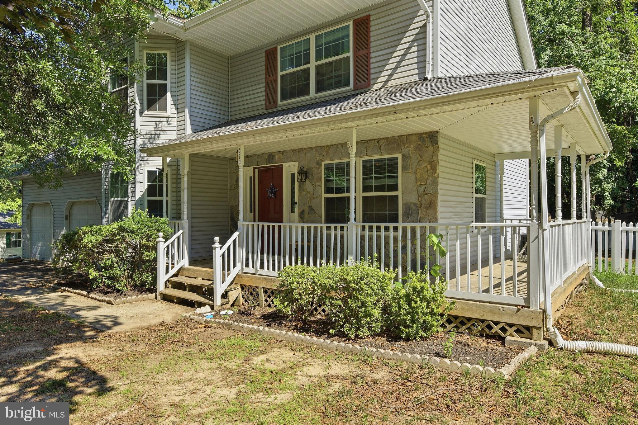 1040 Redeye Road Lusby, MD 20657 - Photo 42 of 51 Wraparound porch in the front
