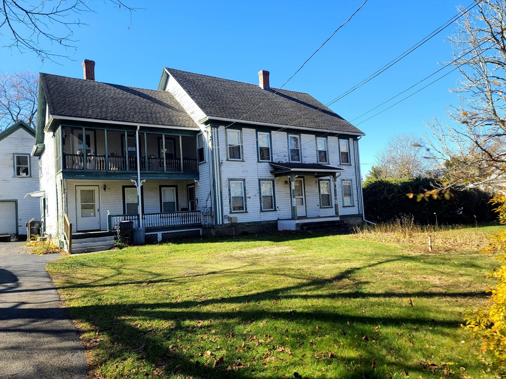 10 Maple Avenue Grafton, MA 01560 - Photo 1 of 9 a view of a house with swimming pool and a yard