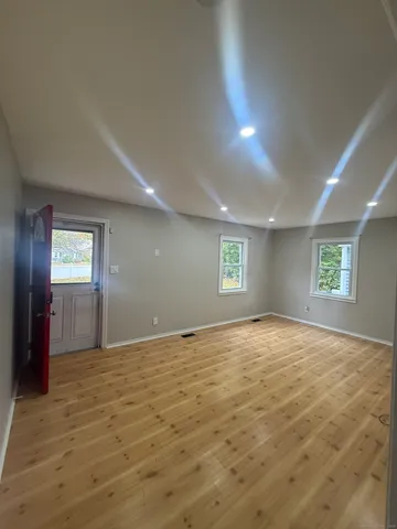 a view of an empty room and window