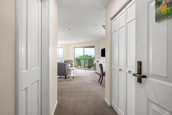 a view of a livingroom with couch and a window