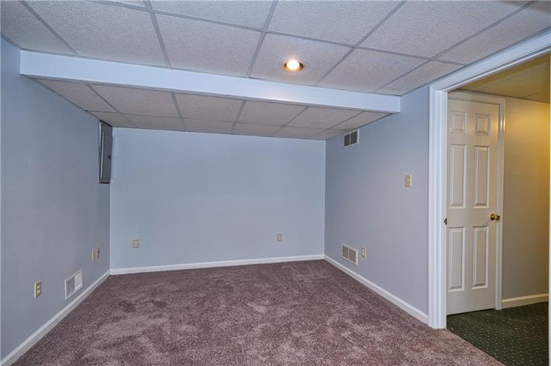 110 Conway Wallrose Road Freedom, PA 15042 - Photo 23 of 25 Large finished game room!