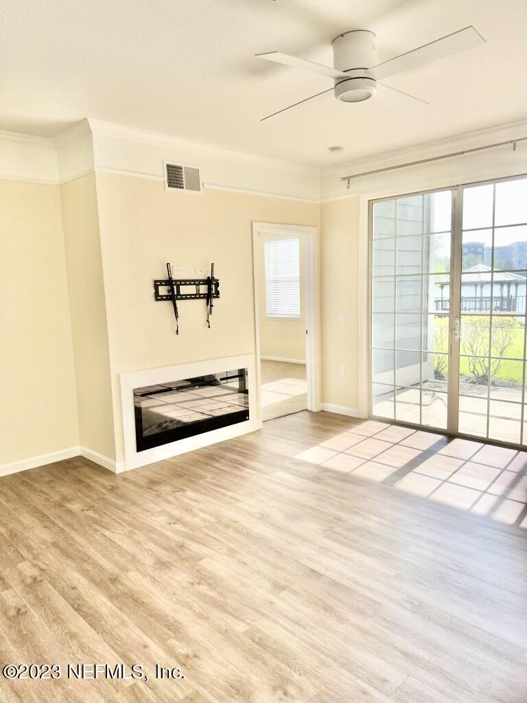 8550 Touchton Road, Unit 1018 Jacksonville, FL 32216 - Photo 4 of 15 a view of an empty room with a window