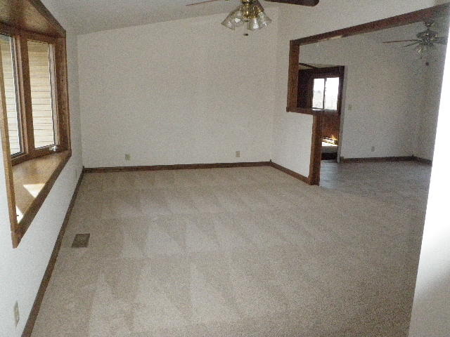 2353 North 2420th Road Marseilles, IL 61341 - Photo 3 of 15 a view of a room with a fireplace and window