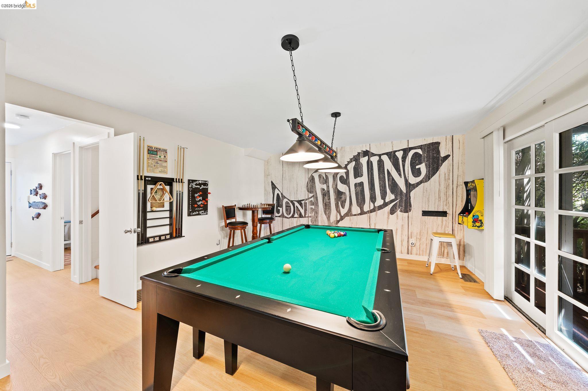 1704 Taylor Road Bethel Island, CA 94511 - Photo 14 of 73 Recreation room featuring a pool table with pendant lighting, light wood-finish flooring, and French doors