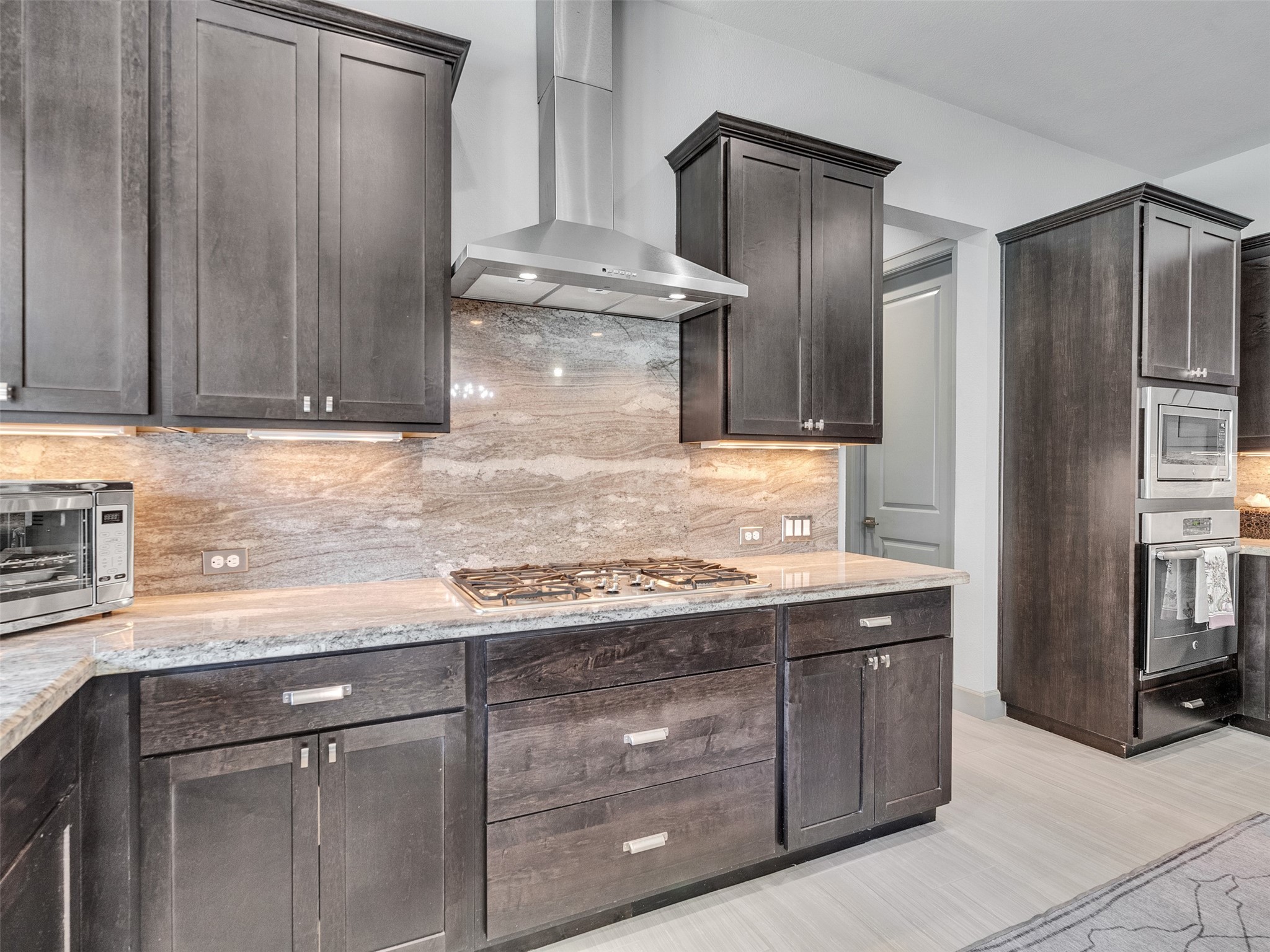 7415 Nantucket Point Lane Spring, TX 77389 - Photo 15 of 49 a kitchen with a refrigerator and a sink
