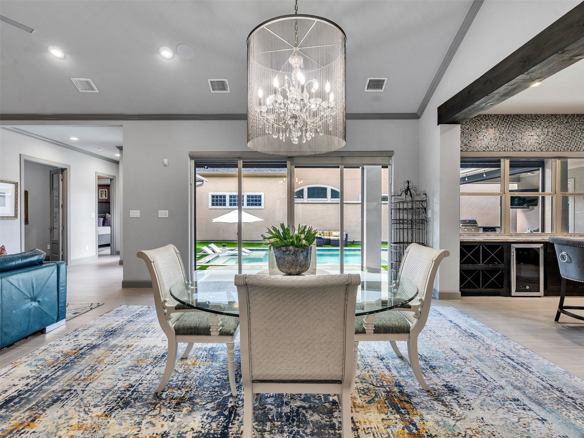 7415 Nantucket Point Lane Spring, TX 77389 - Photo 18 of 49 a view of a dining room with furniture a chandelier and wooden floor