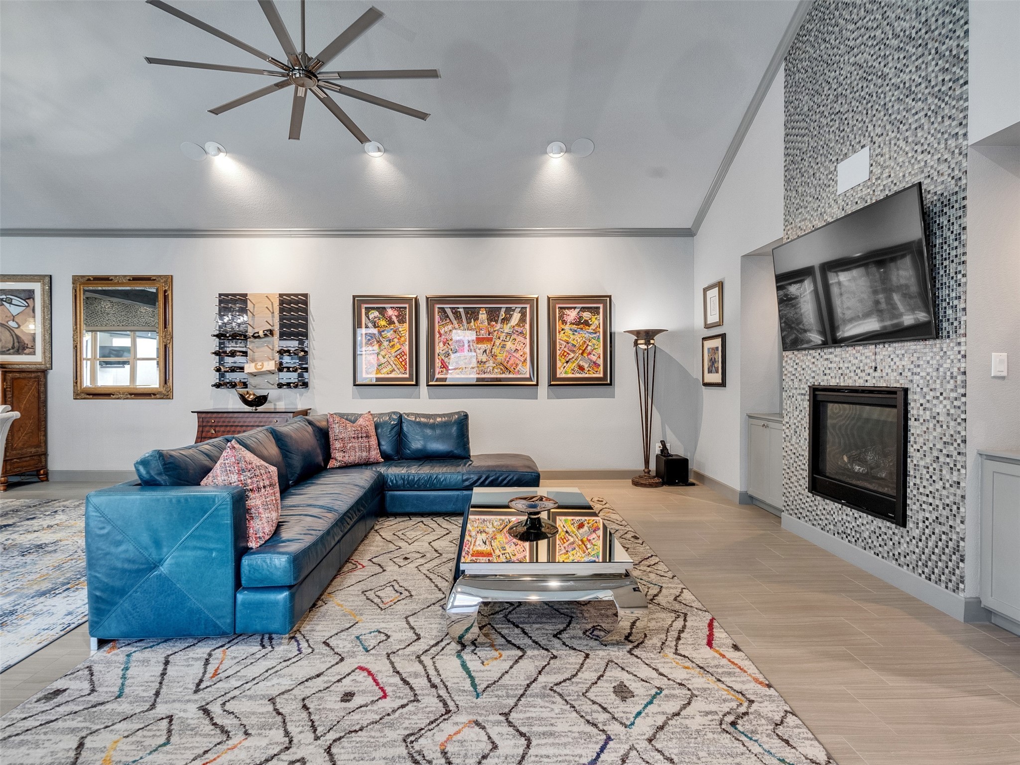7415 Nantucket Point Lane Spring, TX 77389 - Photo 19 of 49 a living room with furniture a flat screen tv and a fireplace