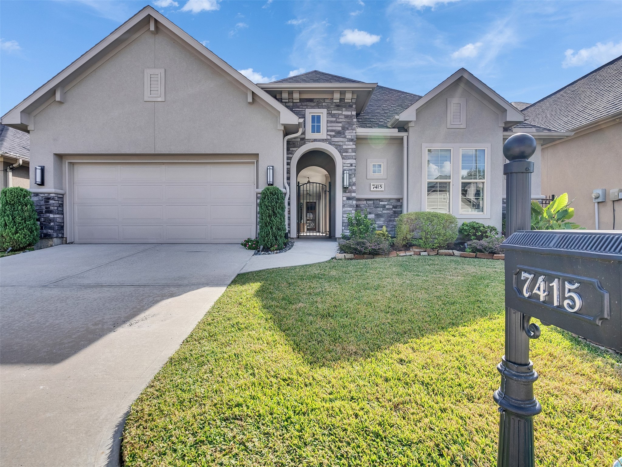 7415 Nantucket Point Lane Spring, TX 77389 - Photo 2 of 49 a front view of a house with garden