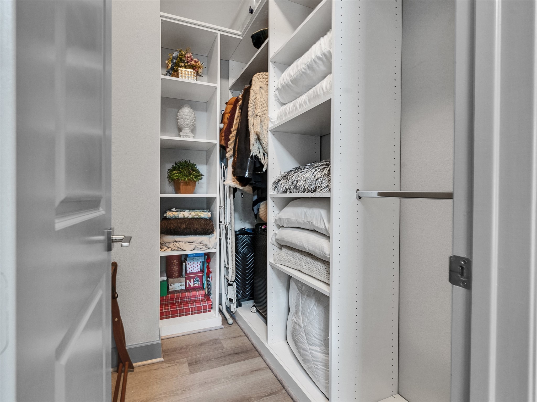 7415 Nantucket Point Lane Spring, TX 77389 - Photo 26 of 49 a view of walk in closet with clothes and shoes