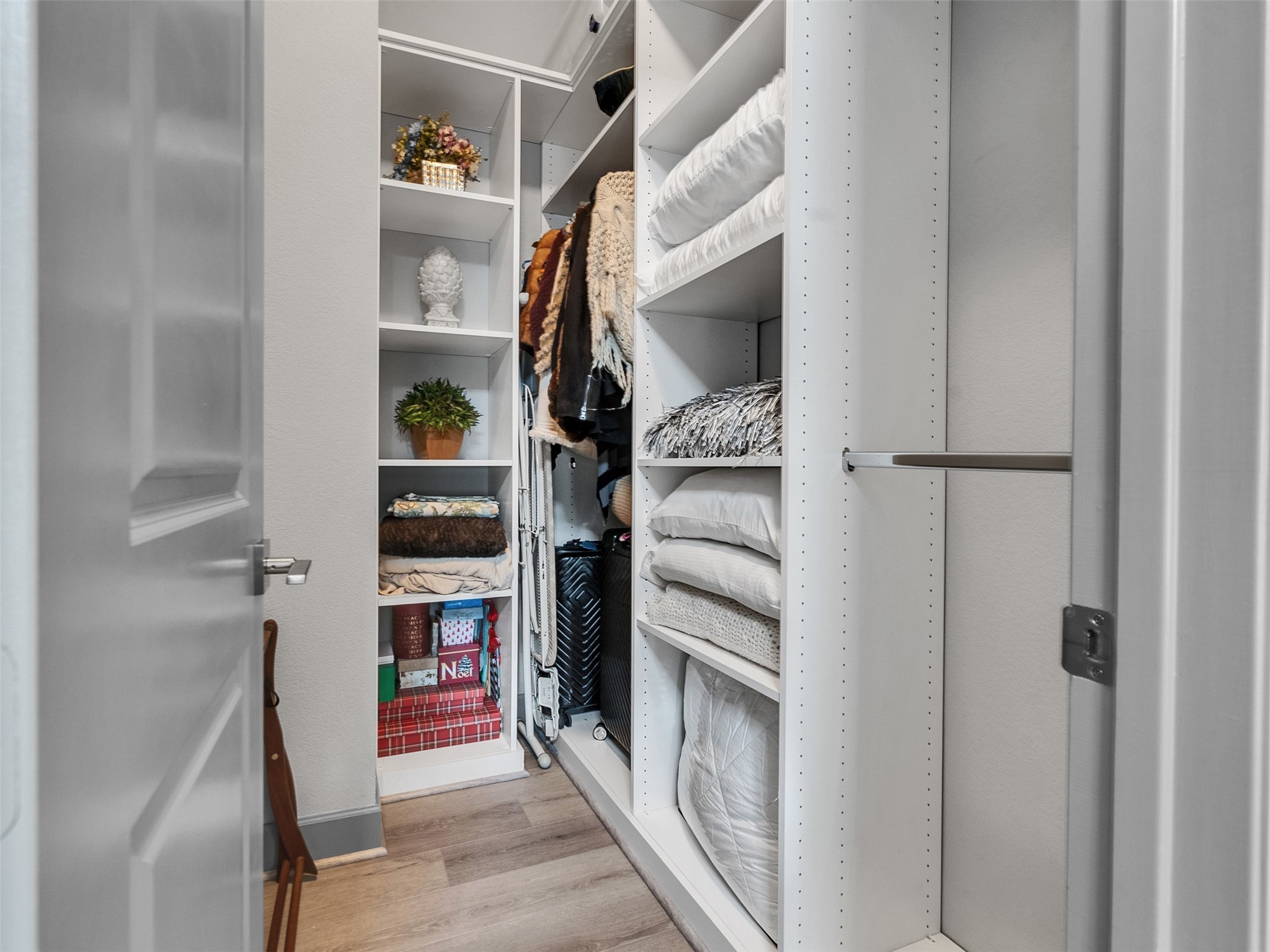 7415 Nantucket Point Lane Spring, TX 77389 - Photo 26 of 49 a view of walk in closet with clothes and shoes