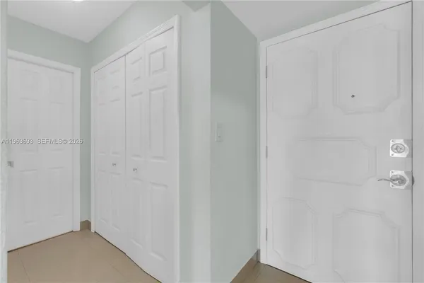 a view of a livingroom from a hallway