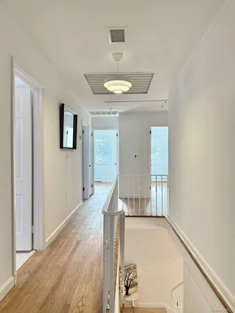 a bathroom with a double vanity sink toilet and shower