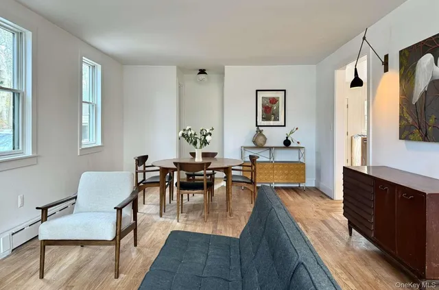 a living room with furniture and a table