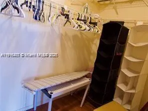 a view of balcony with wooden floor