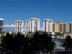 a view of a city with tall buildings