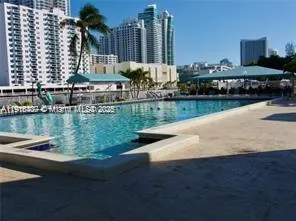 a view of lake and a city