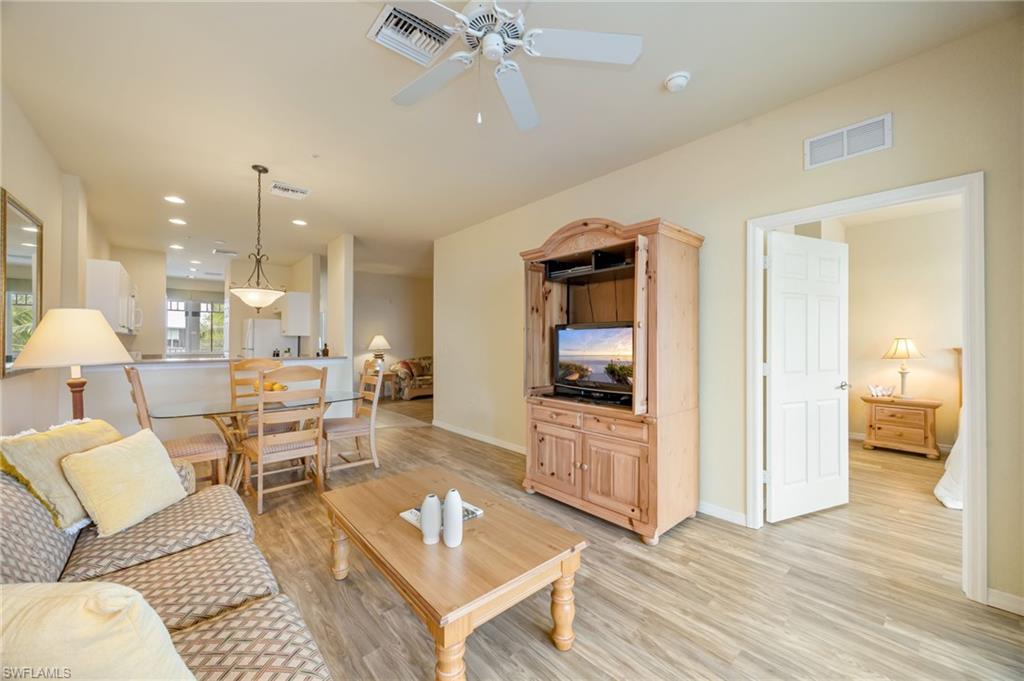 7920 Mahogany Run Lane, Unit 1024 Naples, FL 34113 - Photo 6 of 28 The versatile den can easily serve as a home office, media room, or additional guest accommodations.