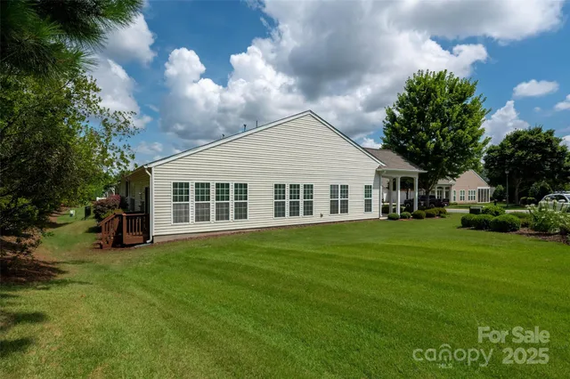 a view of a house with a big yard