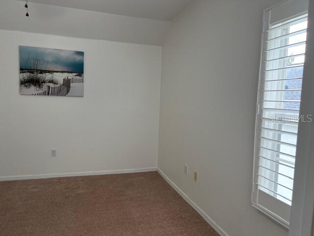 947 Spring Park Loop, Unit B Kissimmee, FL 34747 - Photo 8 of 10 a room that has a window in it