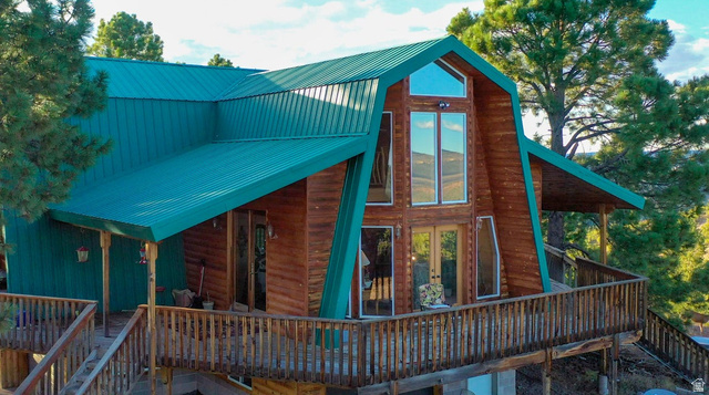 2498 West Silverado Ridge Alton, UT 84710 - Photo 2 of 51 View of home's exterior with a deck and a metal roof