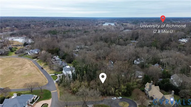 an aerial view of a house with outdoor space