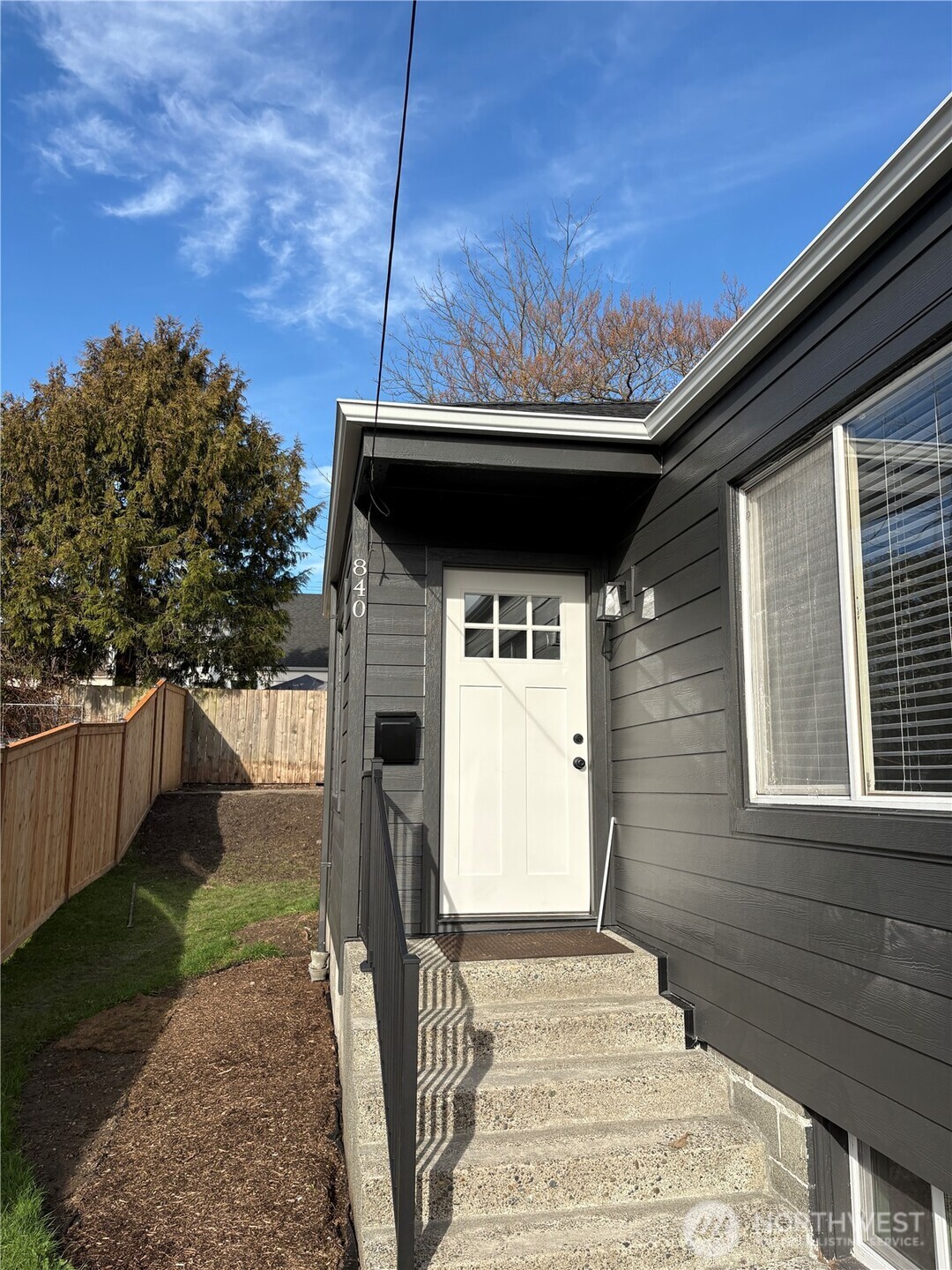 840 Northwest 54th Street Seattle, WA 98107 - Photo 1 of 1 a front view of a house with a yard