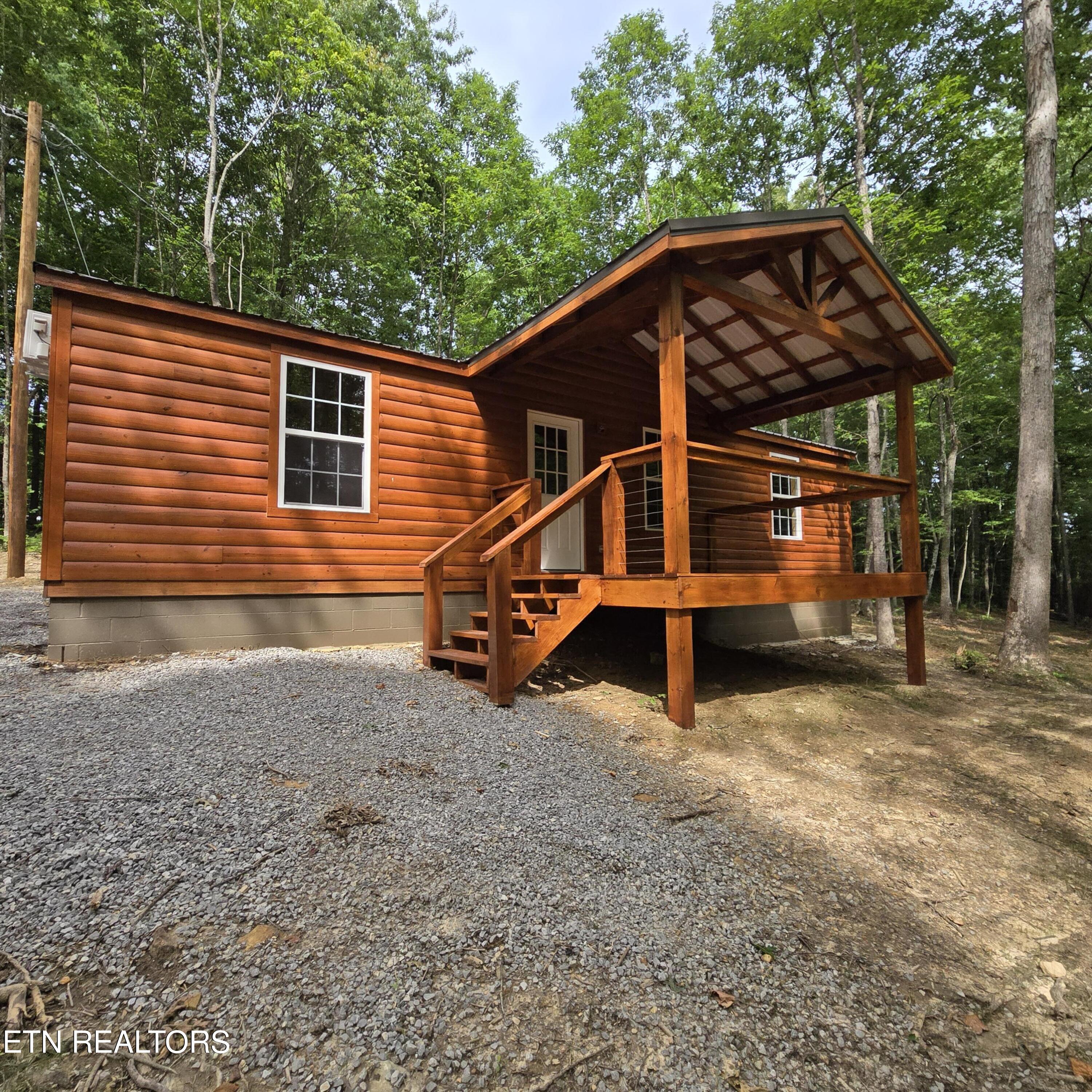 137 John Cox Road Deer Lodge, TN 37726 - Photo 2 of 43 20240612_162752