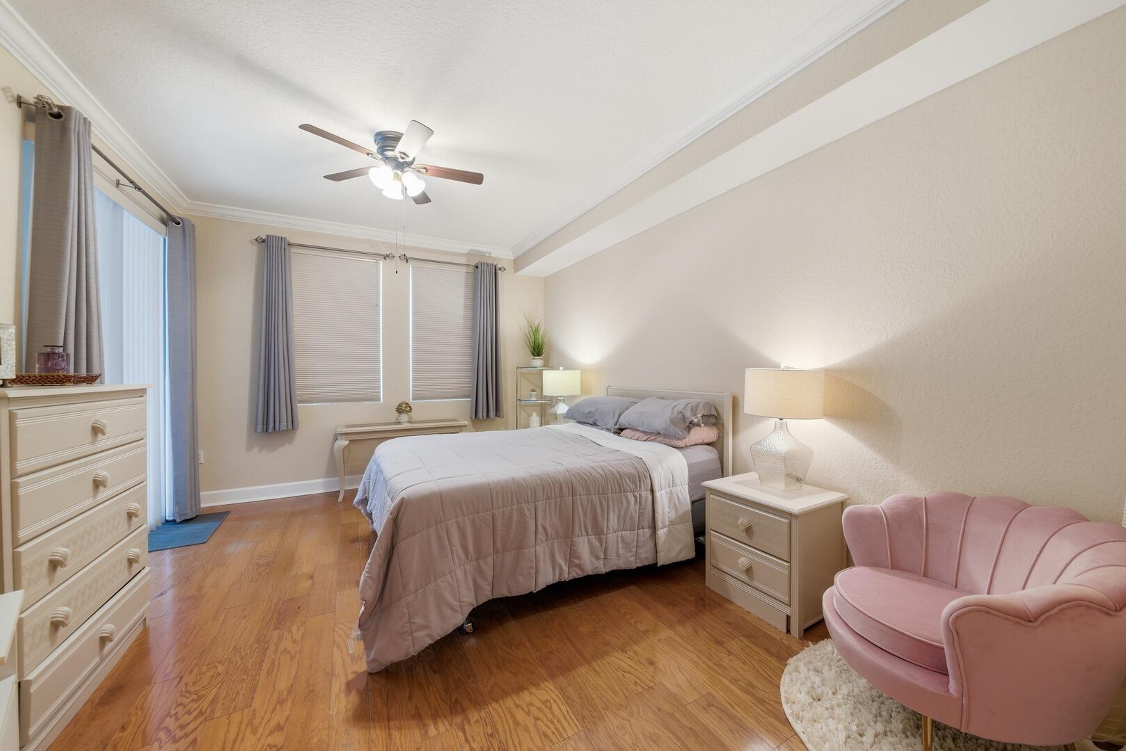 4 Renaissance Way, Unit 110 Boynton Beach, FL 33426 - Photo 14 of 23 a bedroom with bed and a couch